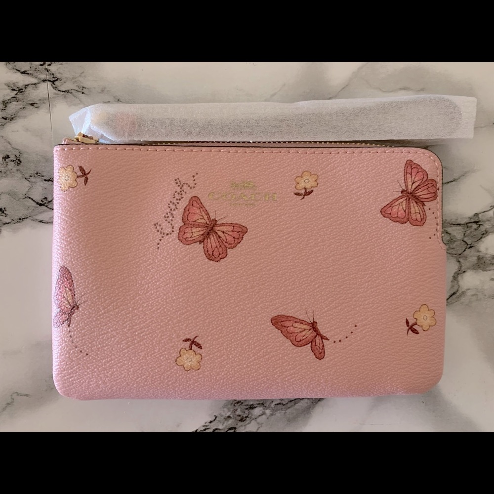 Coach butterfly and flower wristlet